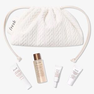 fresh Skincare Set with Cream Drawstring Pouch and Gold-Toned Bottle